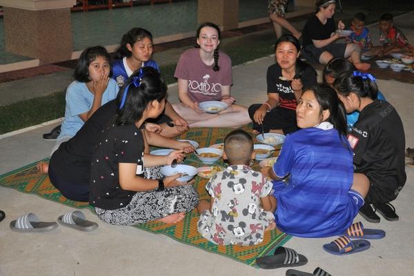 WCHS students sharing a meal in Thailand